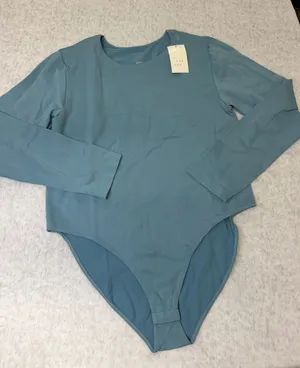 A New Day Womens 1X Teal Blue Long Sleeve Crew Neck Bodysuit NWT F00302494 thumbnail 1