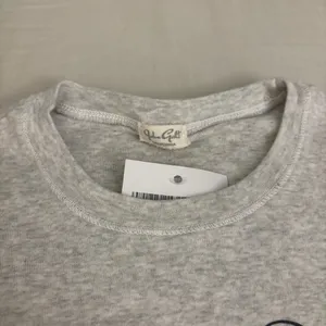 Brandy Melville baby bear honey top thumbnail 3
