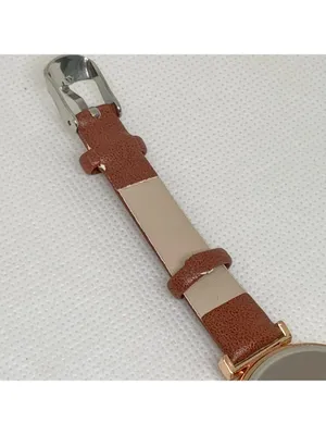 Women’s quartz analog watch gold tone 34mm round case brown leather band running thumbnail 6
