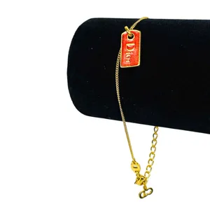 Christian Dior Gold Tone Red Dior Enamel Tag Charm Bracelet thumbnail 2