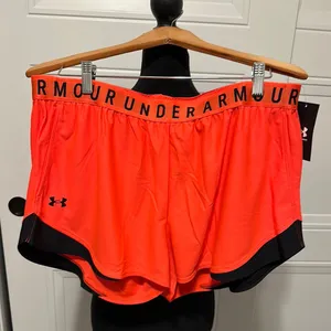 Under Armour Women's Orange Shorts with side pockets thumbnail 1