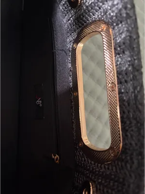 Black and gold handbag thumbnail 3