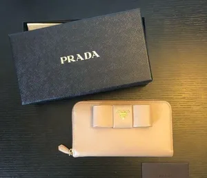 Prada Saffiano Ribbon Bow Zip Around Wallet thumbnail 1