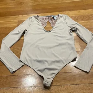 Revamped tan lace one piece body suit size medium. thumbnail 1