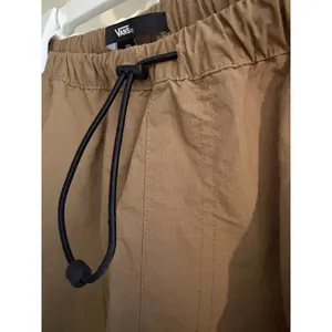 Vans Riley Cargo Parachute Pants (Style VN000JD0YJ2) in brown color thumbnail 4