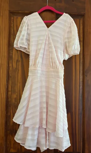 Francesca's pink textured romper thumbnail 1