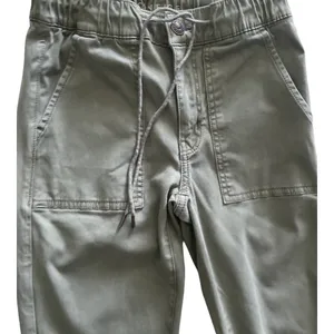 American Eagle -ARMY GREEN JOGGER PANTS-SIZE 2 Elastic waist with drawstring, zip front, two front and two back pockets, elastic ankles with a side zipper, excellent condition Measurements: Waist: side to side 13-16 inches Rise: 9 inches Inseam: 37 inches thumbnail 5