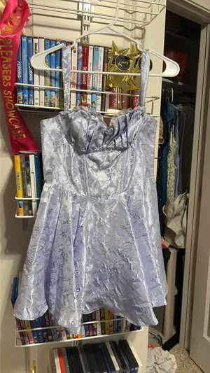 A light blue, lace looking, short dress. thumbnail 2