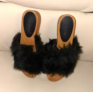Free People "Sonnet" clogs, characterized by their wooden sole and black synthetic leather details. Size 7 thumbnail 1