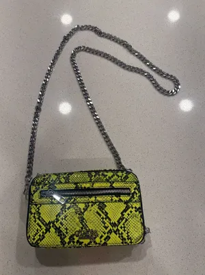 Guess snake skin crossbody bag thumbnail 1