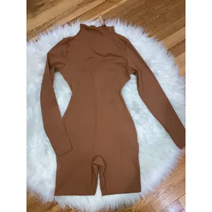 SKIMS Size Small ALL-IN-ONE LONG SLEEVE MID THIGH ONESIE CARAMEL NWT Jumpsuit thumbnail 2