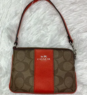 COACH Brown and Orange Coated Canvas Wristlet thumbnail 1