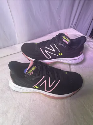 New Balance Women's Sneaker in Black with Pink & Neon Green Accents thumbnail 3