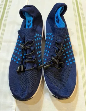 Navy Blue Lightweight Knit Athletic Shoes with Blue Accents thumbnail 1
