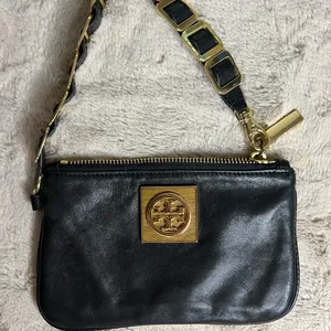 Tory Burch Black and Gold Clutch with Leather Finish and Zipper Closure thumbnail 1