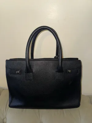 Women’s black handle bag with metal design in the front thumbnail 2