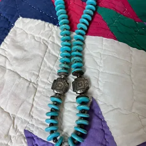 Beautiful necklace. Looks like turquoise and silver. I believe it is howlite. thumbnail 4