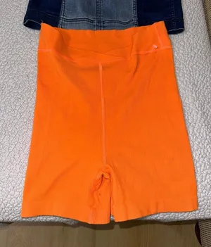 Free people movement orange shorts thumbnail 1