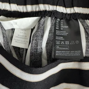 H&M Striped Culotte Pants Women 12 Black White Tan Wide Leg Cropped Pull On thumbnail 7