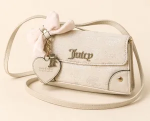Juicy Couture ivory logo jacquard crossbody bag thumbnail 1