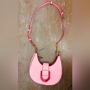 CHARLES & KEITH’s Limited-edition collaboration ITZY Gabine hobo saddle bag. thumbnail 5