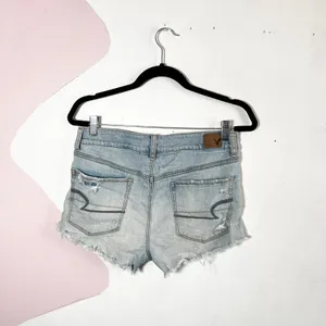 American Eagle Distressed Denim Shorts Size 10 Lace Underlay Light Wash Cut Offs thumbnail 2