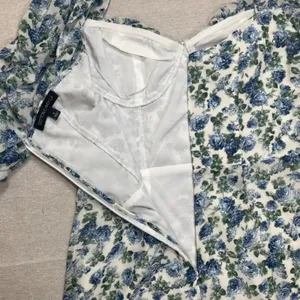Cotton Candy | NWOT Blue and White Floral Ruched Peasant Dress | Small thumbnail 9
