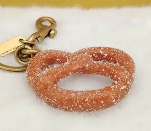 Coach Pretzel Bag Charm thumbnail 1