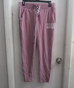 PINK Victoria's Secret shoelace front leggings pink nation on left leg drawstring in pink and white size medium. thumbnail 1