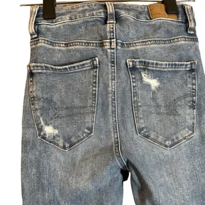 American Eagle Women’s Blue Distressed Shark Bite Fringe Denim Jeans Size 0R thumbnail 9