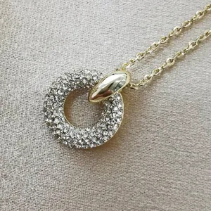 Kendra Scott Mikki Pave Pendant Necklace is a gold-toned necklace thumbnail 7