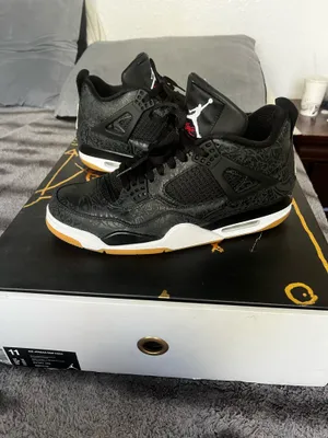 Laser Black Jordan 4 Retro Sneakers thumbnail 1