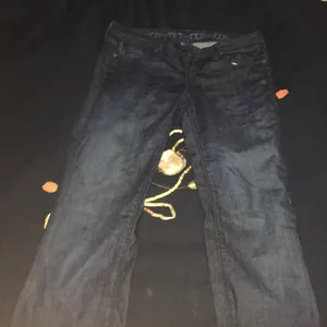 Dark colored flare jeans thumbnail 4