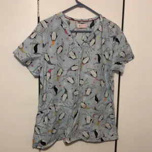 White Cross Penguin Women’s Large Blue Color Scrub Top thumbnail 1