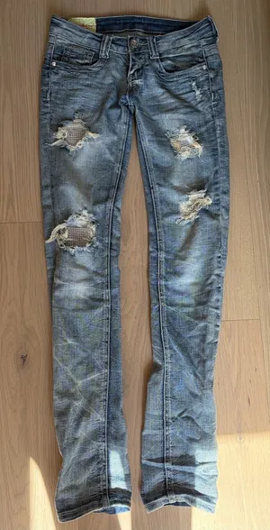 Machine distressed crystal embellished low rise denim jeans thumbnail 1