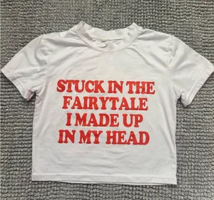 “Stuck in the fairytale I made up in my head” Baby Tee thumbnail 1