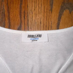 double zero white long sleeve faux wrap top thumbnail 3