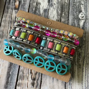 Set of 5 stackable bracelets in shimmering crystals and multi colored gemstones thumbnail 1