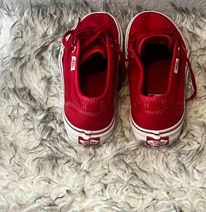 Red Vans Sneakers – Women’s Size 7 (Fits 8) Classic low-top red Vans with white stitching and sole. Barely worn, excellent condition. Labeled as US Women’s 7, but they fit more like an 8. Perfect for everyday style or streetwear looks. thumbnail 2