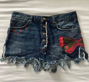 Free People Distressed Denim Butterfly Shorts thumbnail 1