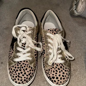 Stylish Gold and Black Women's Sneakers thumbnail 1