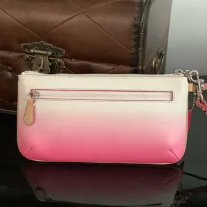 Coach wristlet - nice colors for summer 🌷🌷🌷 thumbnail 2