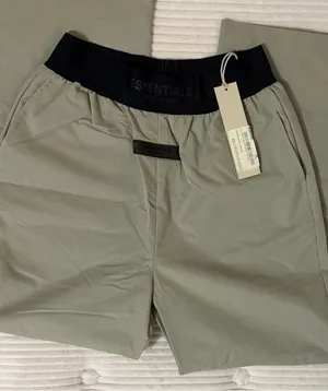 ESSENTIALS Wide Leg Pants in Olive Green with Black Waistband thumbnail 1
