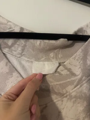 These Three Boutique Grove the Brand Camo V-neck thumbnail 3