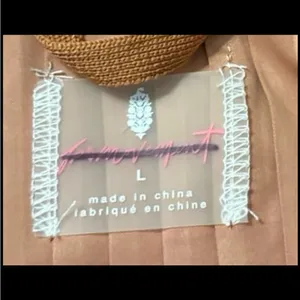Free People FP Movement Pleaty Please Vest in the color Sequoia. Size Large thumbnail 4