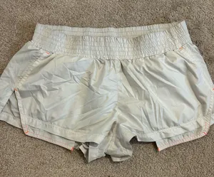 Free People Movement white shorts w/pink stitching thumbnail 1