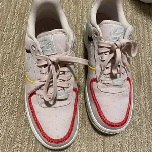 Pink Nike stitched Air Force ones thumbnail 2
