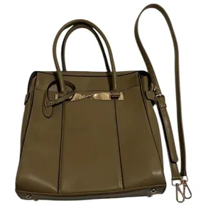 Beautiful green crossbody handbag Lots of details and pockets EUC thumbnail 1