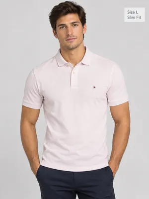 Classic short-sleeve polo shirt with signature embroidered chest flag logo, multi-button placket, and tailored silhouette. thumbnail 1