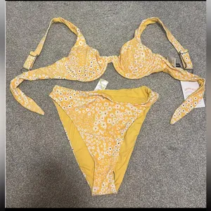 Dippin’ Daisy’s Yellow Floral High-Cut Bikini Bottoms thumbnail 1